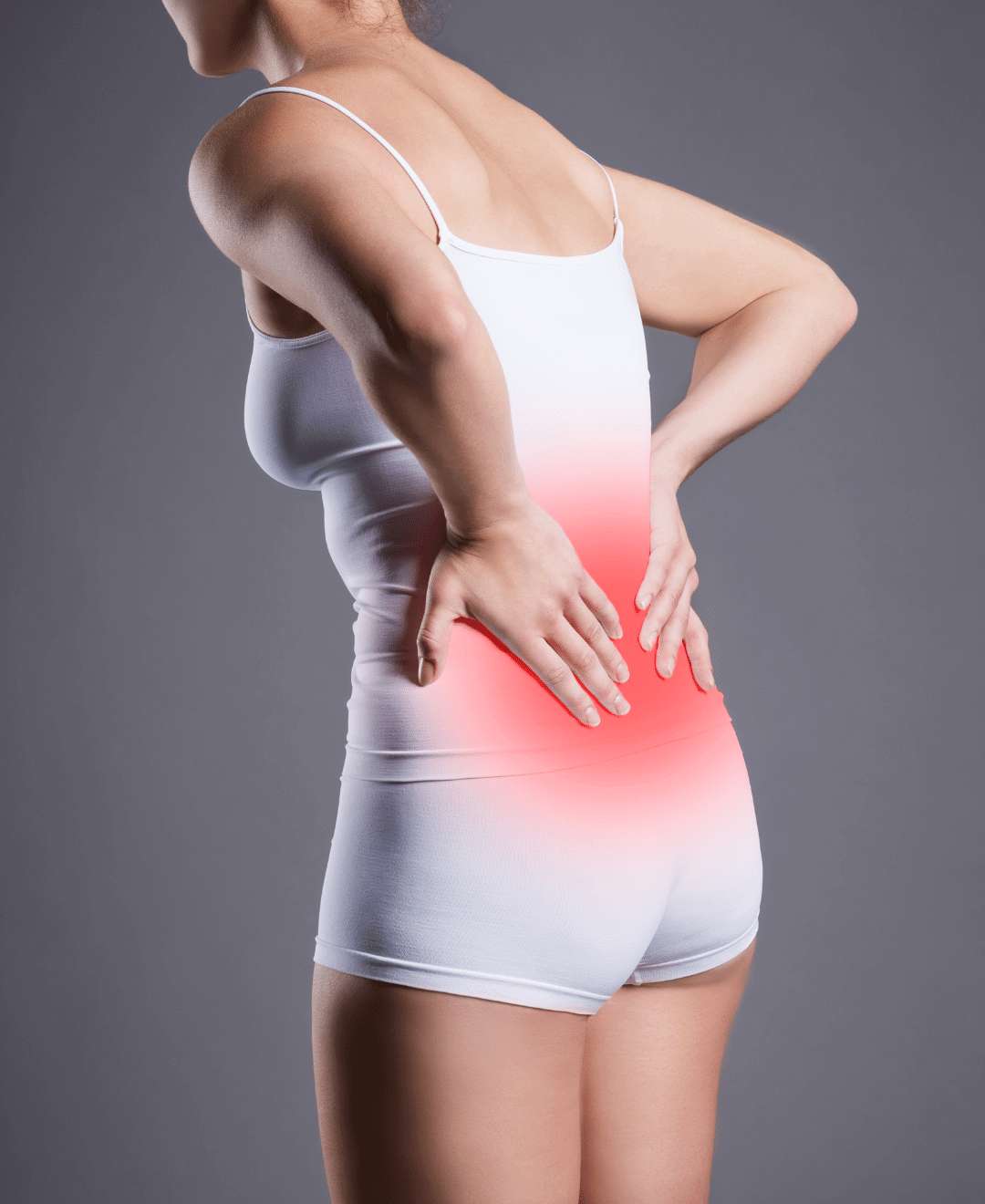 Sciatica pain Woman holding her back in pain from sciatica